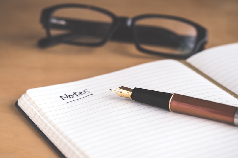 Notebook and pen for keeping a food log to track eating habits