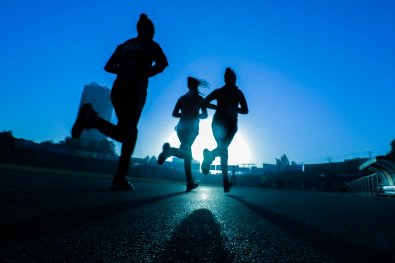 Person walking after dinner to aid weight loss and digestion